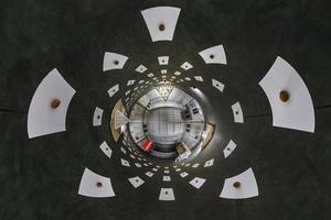 Abstract view of little planet transformation of spherical panorama 360 degrees. Spherical abstract aerial view in warehouse room. Curvature of space. photo