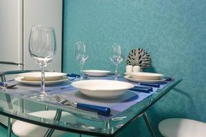 guest table in Interior of the modern luxure kitchen in studio apartments in minimalistic style photo