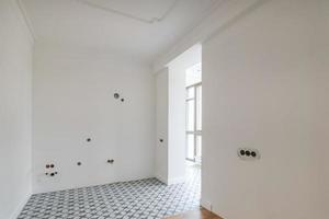 empty white room with repair and without furniture photo