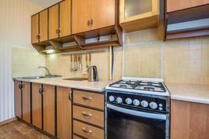 Interior of the modern luxure kitchen  in studio apartments in minimalistic style photo