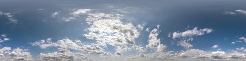 Seamless blue sky hdri panorama 360 degrees angle view with zenith and beautiful clouds for use in 3d graphics as sky dome or edit drone shot photo