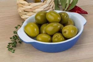 Marinated green olives photo