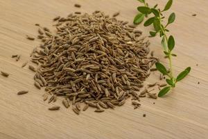 Zia seeds on wooden background photo