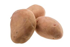 Potatoes on white background photo