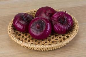 Violet onion in a bowl photo