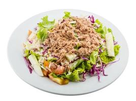 Tuna salad on the plate and white background photo