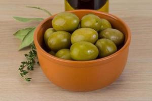 Marinated green olives photo