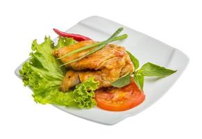 Baracuda steak on the plate and white background photo