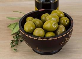 Marinated green olives photo