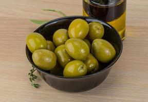 Marinated green olives photo
