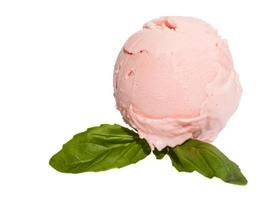 Scoop of strawberry ice cream from top on white background with mint photo