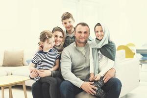 portrait of young happy modern muslim family photo