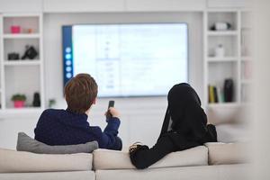 Young muslim couple enjoing time together at home during Ramadan photo
