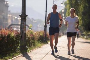 Couple jogging outside photo