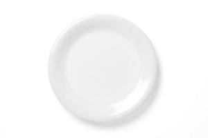 Empty plate isolated on white photo