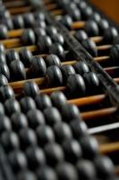 Vintage wooden abacus on the table photo