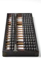 Vintage wooden abacus isolated on white photo