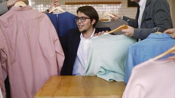 Clothing offer shirts to business worker video