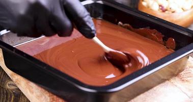 making chocolate from high-quality cocoa and cocoa butter with sugar photo