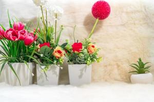 Decorative tree in vase on table photo