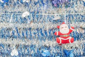 Santa Claus on tinsel  background photo