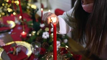 Christmas girl lights candle video