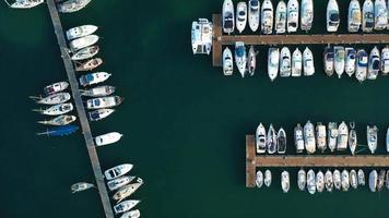 Aerial view of boats in harbor of San Antonio on coast of Ibiza video