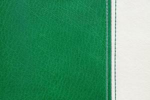 Green and white leather with decorative seam texture background photo