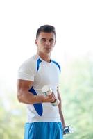 man exercise with weights photo