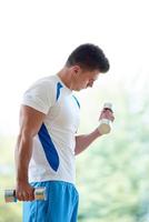man exercise with weights photo