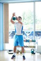 man exercise with weights photo