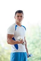 man exercise with weights photo