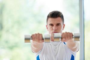 man exercise with weights photo