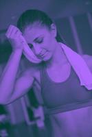 woman exercising on treadmill in gym photo