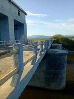 the pedestrian bridge that connects two village roads photo