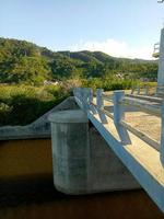 the pedestrian bridge that connects two village roads photo