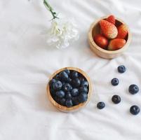 Fresh blueberry and strawberry from the farm serving to bed for breakfast photo