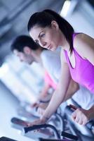 woman exercising on treadmill in gym photo