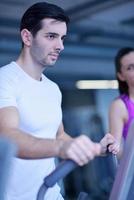 man running on the treadmill photo