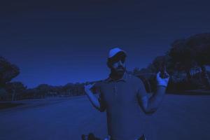 golf player portrait at course photo