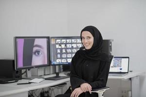 Portrait of young muslim female graphic designer photo