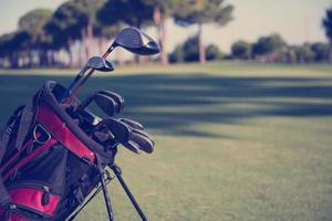 close up golf bag on course photo