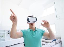 man using VR-headset glasses of virtual reality photo