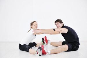 happy young couple fitness workout and fun photo