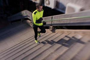 man jogging on steps photo