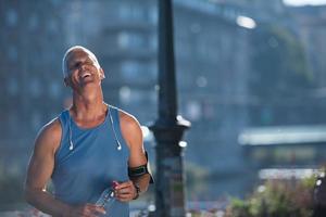 portrait of handsome senior jogging man photo