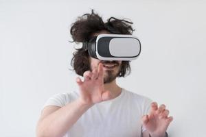 Man using headset of virtual reality photo