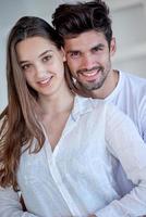 happy young romantic couple have fun arelax  relax at home photo