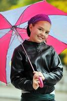 happy girl with umbrella photo