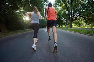 couple jogging outside photo